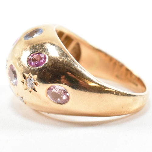 54a - A hallmarked 18ct gold sapphire and diamond set dome ring. Hallmarked Birmingham, 2009, sponsors mar... 