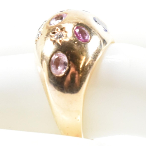 54a - A hallmarked 18ct gold sapphire and diamond set dome ring. Hallmarked Birmingham, 2009, sponsors mar... 