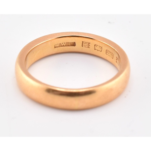 64 - A hallmarked 22ct gold band ring. The 22ct yellow gold band ring hallmarked for London, 1927. Maker'... 