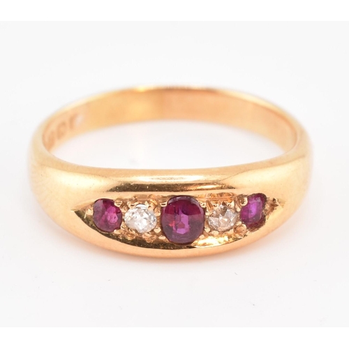 70 - An Edwardian hallmarked 18ct gold, ruby? and diamond? boat ring. The 18ct yellow gold ring set with ... 