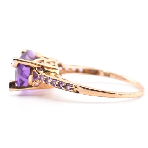 73 - A hallmarked 9ct Rio Grande amethyst and diamond ring. The ring having an east-west set oval cut Rio... 