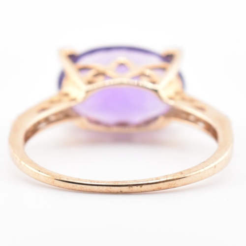 73 - A hallmarked 9ct Rio Grande amethyst and diamond ring. The ring having an east-west set oval cut Rio... 