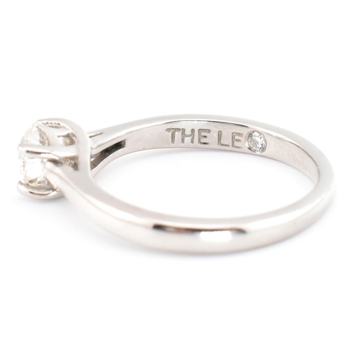 90A - A Leo Diamond 950 platinum and diamond solitaire ring. The Leo Diamond ring set with a single four c... 