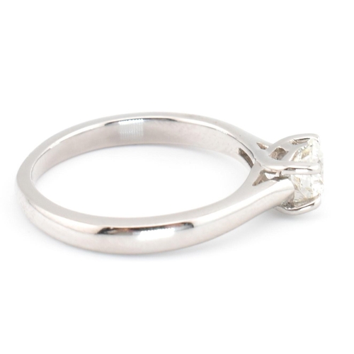 90A - A Leo Diamond 950 platinum and diamond solitaire ring. The Leo Diamond ring set with a single four c... 