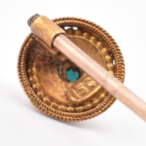 93 - A Victorian 15ct gold and turquoise stick pin. The Victorian 15ct rose gold stick pin having a singl... 