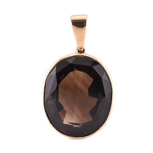 96A - A hallmarked 9ct gold and smoky quartz necklace pendant. The yellow gold necklace pendant having a s... 