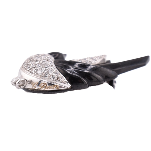 24 - A French hallmarked 18ct gold and diamond Art Deco magpie brooch pin. The Art Deco brooch pin in the... 