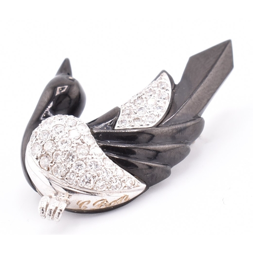 24 - A French hallmarked 18ct gold and diamond Art Deco magpie brooch pin. The Art Deco brooch pin in the... 