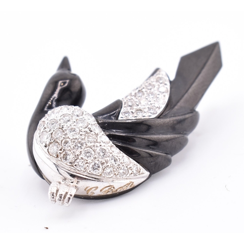 24 - A French hallmarked 18ct gold and diamond Art Deco magpie brooch pin. The Art Deco brooch pin in the... 