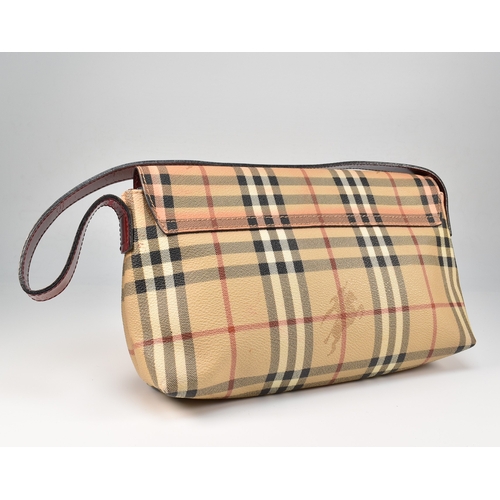 36 - A Burberry Haymarket Nova check shoulder bag. The Burberry shoulder bag having a Nova check PVC exte... 