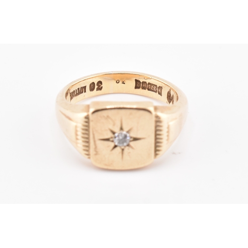 116 - A hallmarked 9ct gold and diamond signet ring. The signet ring having a square head set with a singl... 