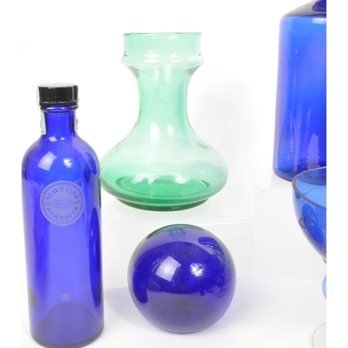 448 - Bristol Blue - Collection of vintage 20th century blue glass items. To include bottles, paperweights... 