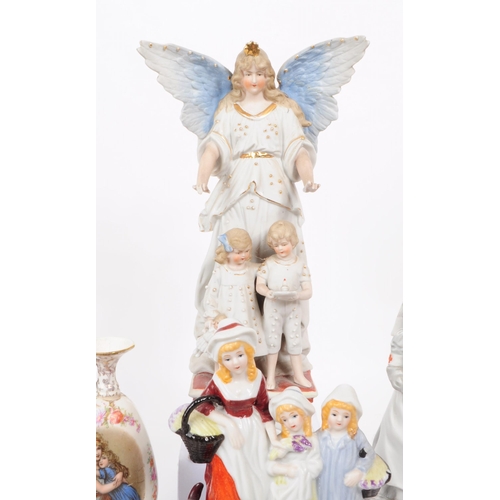 103 - A collection of late 19th / early 20th century bisque porcelain figures, examples including Nurse Cl... 