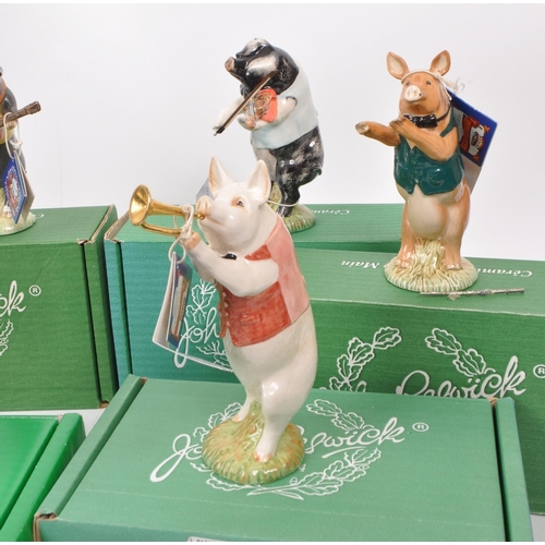 118 - Beswick - A collection of nine (full set) 1990s ceramic ''Pig Promenade' figurines, comprising of: A... 