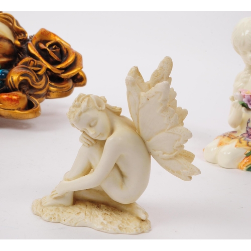 123 - A collection of vintage late 20th century art nouveau style fairy themed figures / ornaments. Compri... 