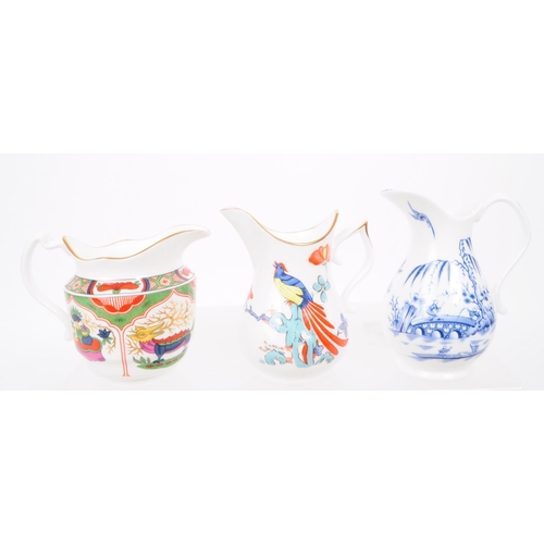 138 - Royal Worcester - Late 20th century set of twelve fine bone china Heirloom Jugs mostly decorated in ... 