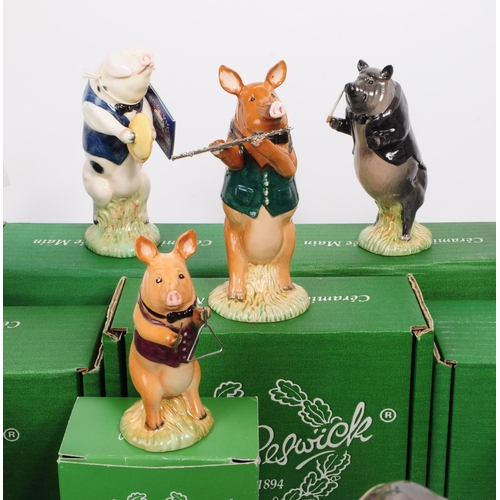 141 - Beswick - Vintage 1990s thirteen porcelain Pig Promenade figurines, comprised of three PP4 Andrew fi... 