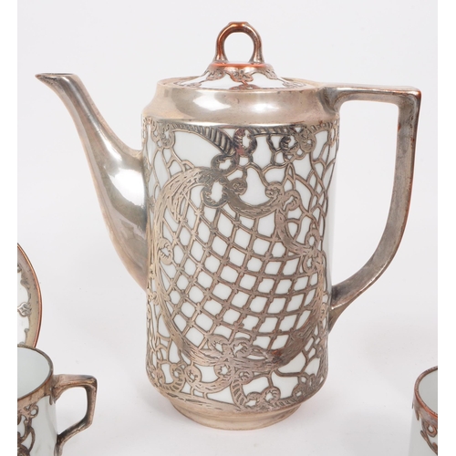 149 - Continental 20th century art nouveau style silver metal overlaid porcelain tea service complete with... 