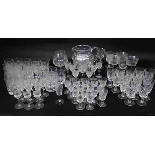 15 - A large collection of 20th century crystal cut drinking glasses, some examples by Thomas Webb, Stuar... 