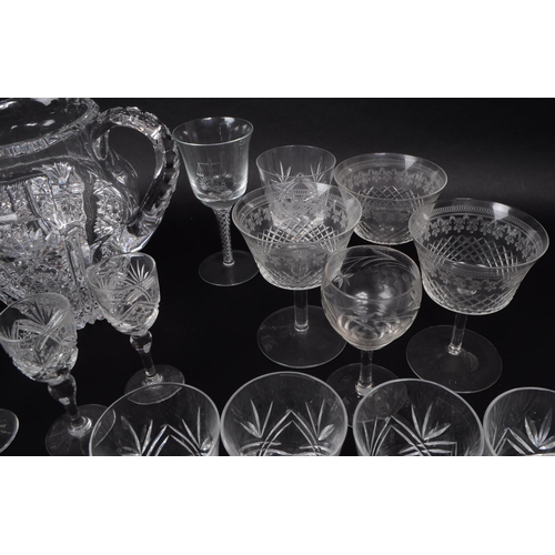 15 - A large collection of 20th century crystal cut drinking glasses, some examples by Thomas Webb, Stuar... 