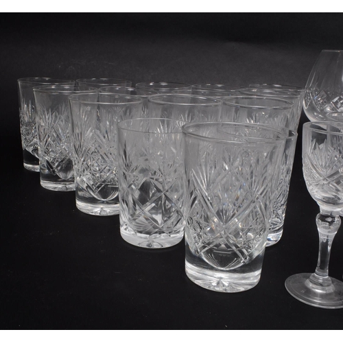 15 - A large collection of 20th century crystal cut drinking glasses, some examples by Thomas Webb, Stuar... 