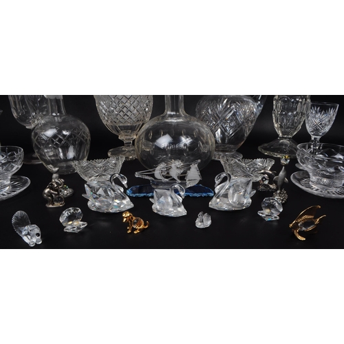 152 - Collection of late 20th century glass wares and Swarovski ornaments. Examples including Stuart cryst... 