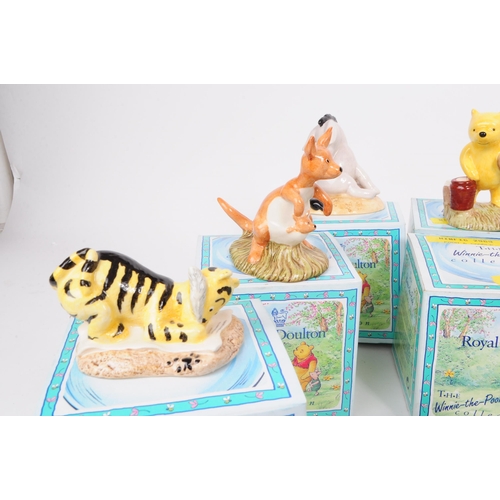 154 - Royal Doulton - Collection of late 20th century twelve Winnie The Pooh bone china figures. Examples ... 