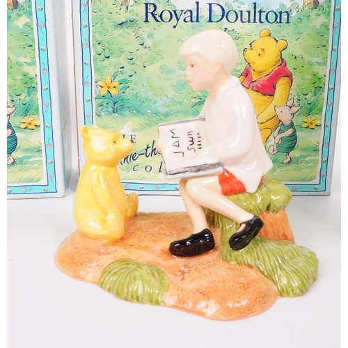 155 - Royal Doulton - Four late 20th century Winnie The Pooh figures. Comprised of Christopher Robin WP9, ... 