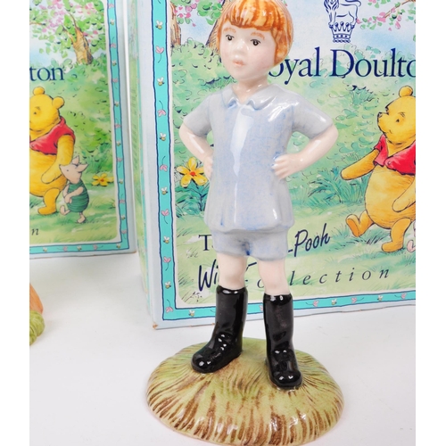 155 - Royal Doulton - Four late 20th century Winnie The Pooh figures. Comprised of Christopher Robin WP9, ... 