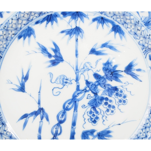 156 - An 18th Century Chinese porcelain blue and white plate of circular form with hand painted floral spr... 