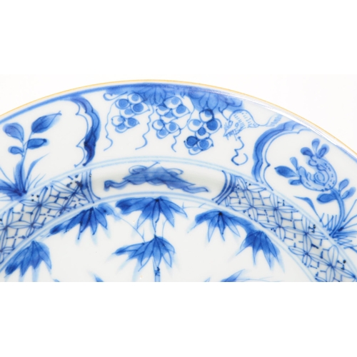 156 - An 18th Century Chinese porcelain blue and white plate of circular form with hand painted floral spr... 