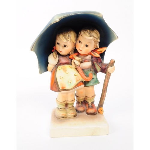 158 - Hummel - W. Goebel - Two vintage mid 20th century West German bisque figures. The collection to incl... 