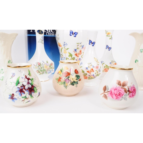 163 - Collection of nine 20th century bone china vases. Comprised of three Crown Devon small squat vases, ... 