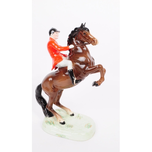 167 - Beswick - W. Goebel - Two vintage 20th century ceramic hunting equestrian figures. To include a Besw... 