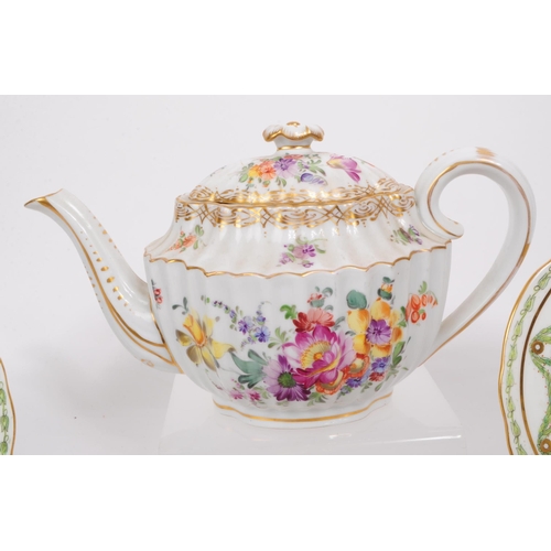 183 - A collection of late 19th and early 20th century continental porcelain pieces. The collection to inc... 