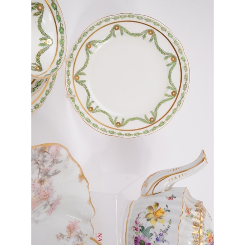 183 - A collection of late 19th and early 20th century continental porcelain pieces. The collection to inc... 