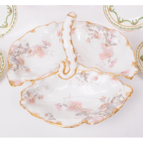 183 - A collection of late 19th and early 20th century continental porcelain pieces. The collection to inc... 