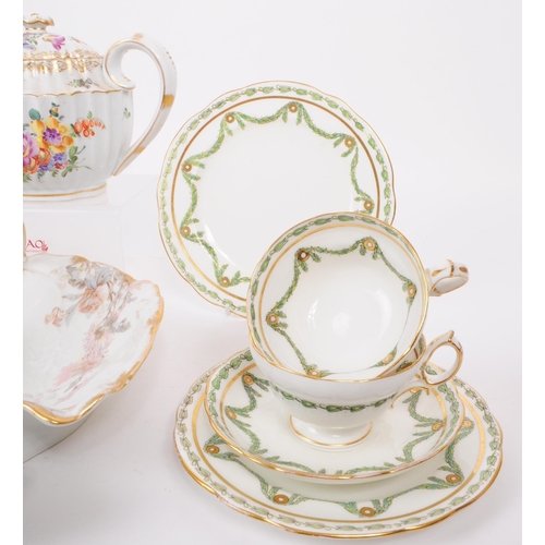 183 - A collection of late 19th and early 20th century continental porcelain pieces. The collection to inc... 