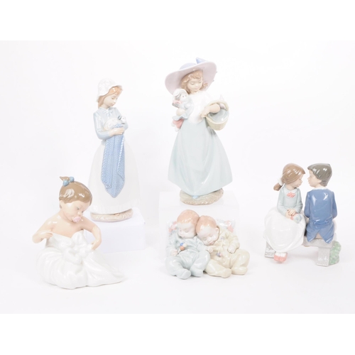 185 - Lladro - Nao - Five late 20th century porcelain figures. Comprised of a two babies no. 5772, a toddl... 