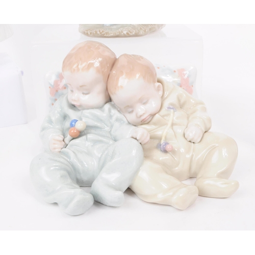 185 - Lladro - Nao - Five late 20th century porcelain figures. Comprised of a two babies no. 5772, a toddl... 