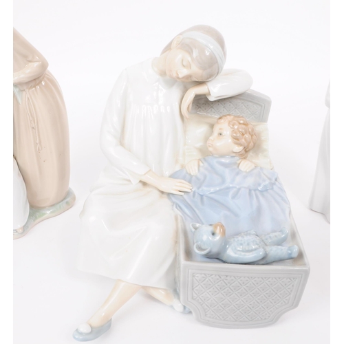 186 - Lladro - Nao - Five late 20th century porcelain figures. Comprised of a mother and a child in a crad... 