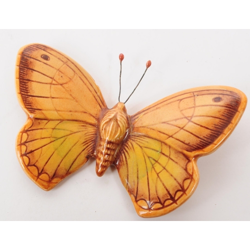 189 - Beswick - Two mid century porcelain butterfly wall hanging figures. Comprised of a Purple Hairstreak... 