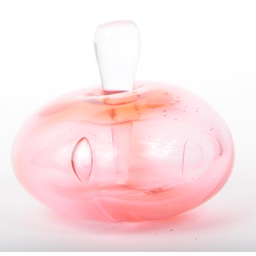 19 - Modern Nutmeg cranberry glass scent bottle. With clear glass droplet form stopper, squat ovoid form ... 