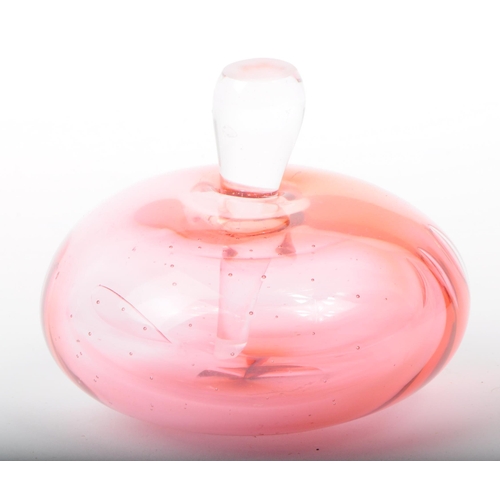 19 - Modern Nutmeg cranberry glass scent bottle. With clear glass droplet form stopper, squat ovoid form ... 