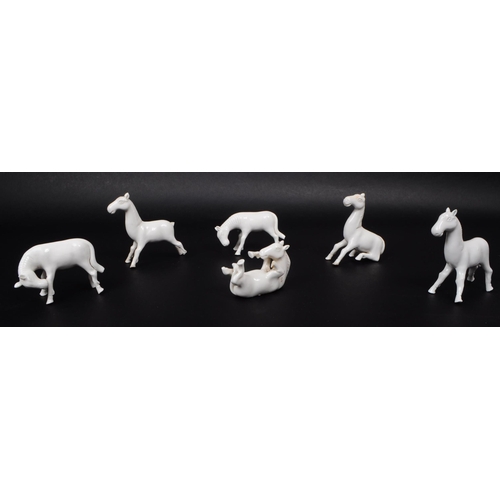 195 - Blanc De Chine - Six Chinese 20th century white porcelain horse figures. Comprised of horses standin... 