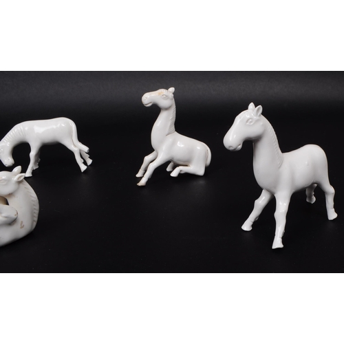 195 - Blanc De Chine - Six Chinese 20th century white porcelain horse figures. Comprised of horses standin... 