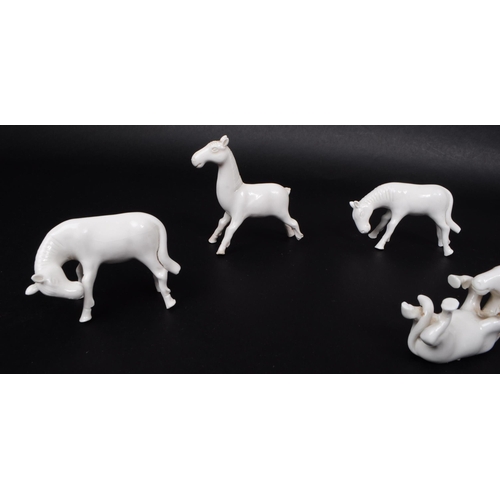 195 - Blanc De Chine - Six Chinese 20th century white porcelain horse figures. Comprised of horses standin... 