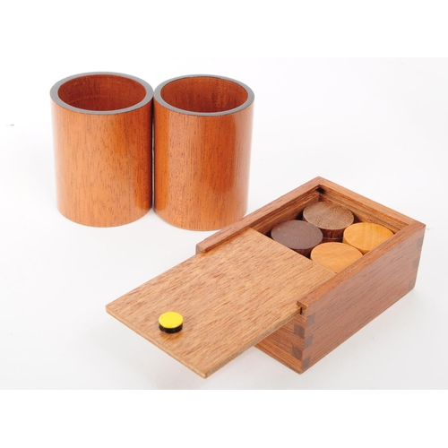 205 - Two modern backgammon board game cases. House in a hinged wooden box. With pieces, black tie sack, t... 