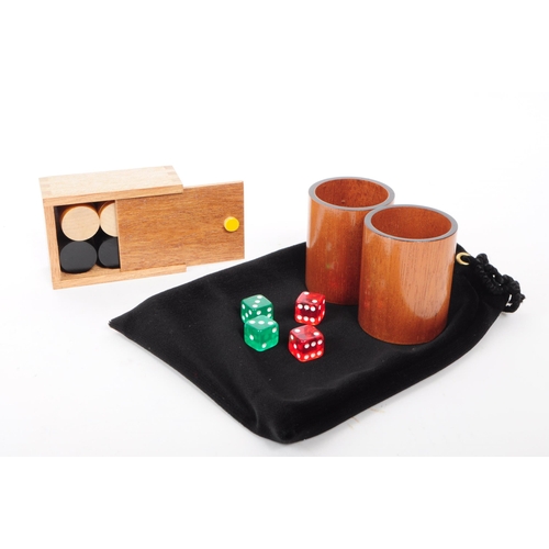 205 - Two modern backgammon board game cases. House in a hinged wooden box. With pieces, black tie sack, t... 