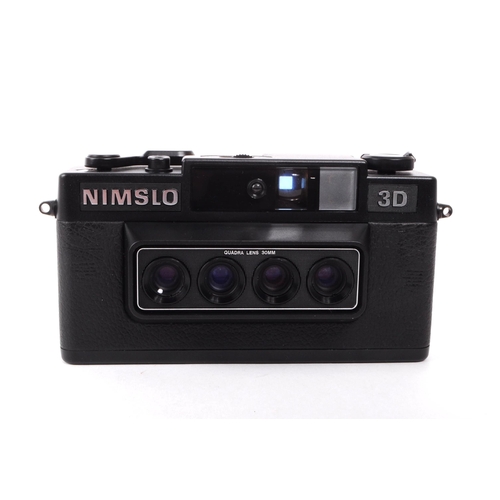 207 - Nimslo - A vintage late 20th century 1980s Nimslo 3D 35mm camera. The camera featuring Quadra 30mm l... 